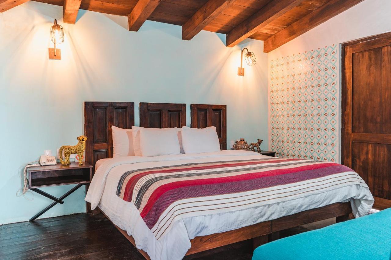 Yox Hotel Boutique San Cristóbal de Las Casas المظهر الخارجي الصورة A bedroom at the hotel