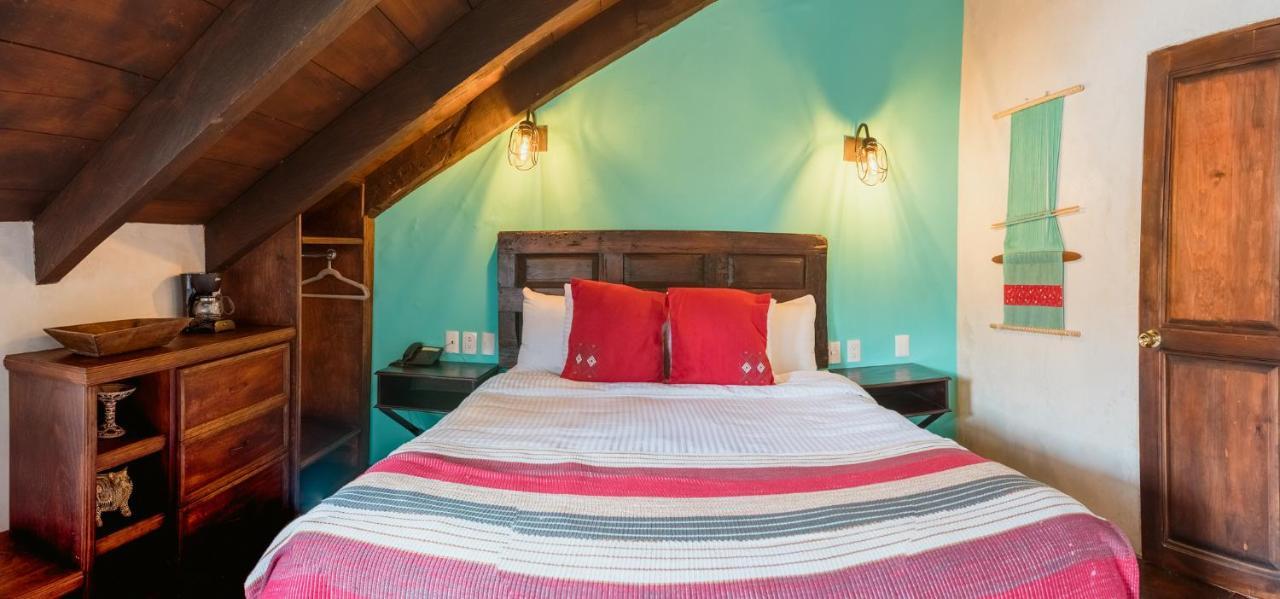 Yox Hotel Boutique San Cristóbal de Las Casas المظهر الخارجي الصورة A bedroom at the hotel