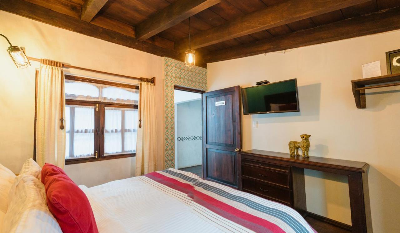 Yox Hotel Boutique San Cristóbal de Las Casas المظهر الخارجي الصورة A bedroom at the hotel