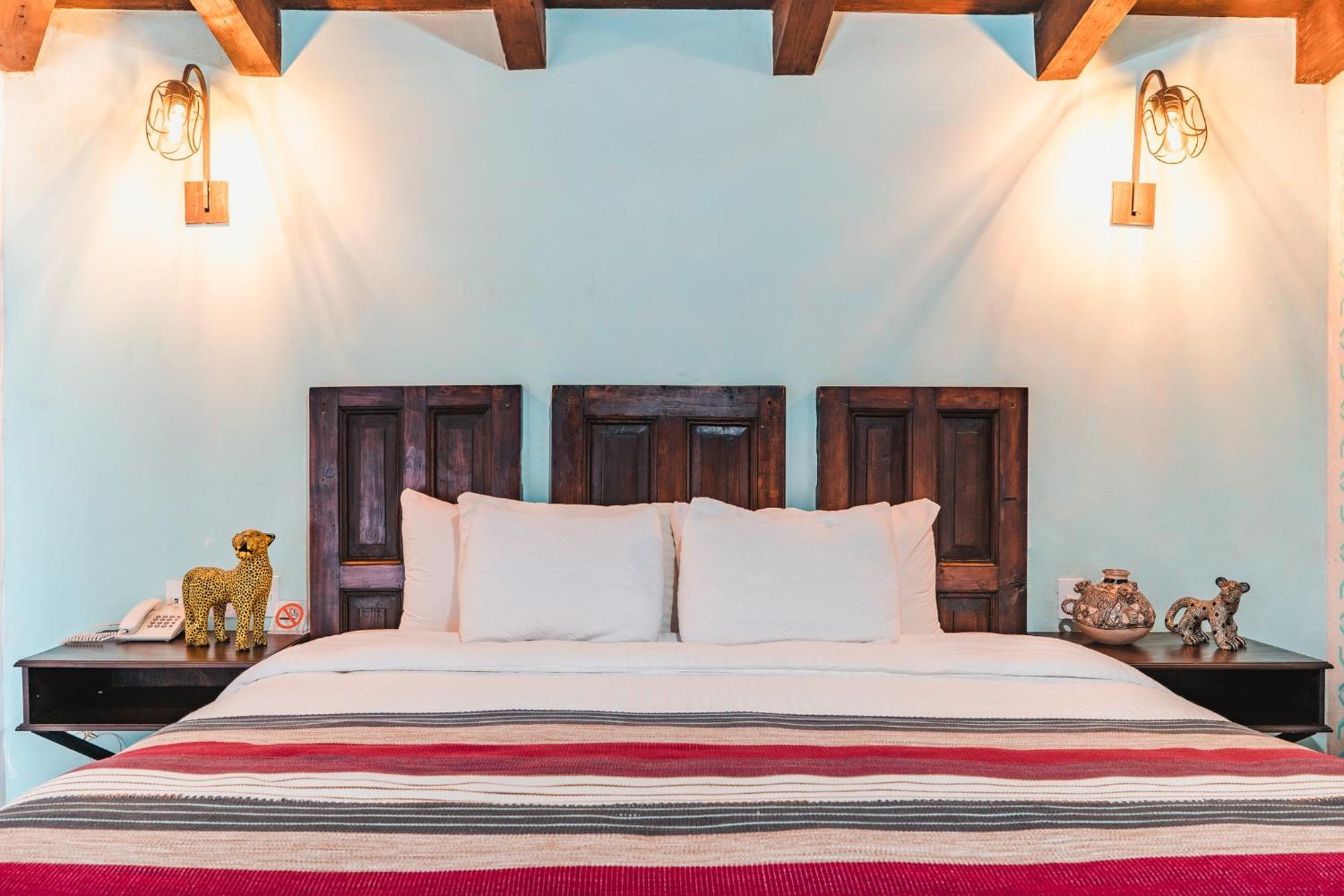 Yox Hotel Boutique San Cristóbal de Las Casas الغرفة الصورة A bedroom at the hotel